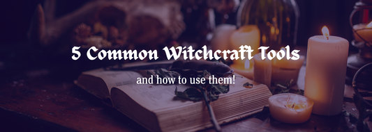 A photo of a witches altar with candles, herbs, and a book with text that reads "5 common witchcraft tools and how to use them"